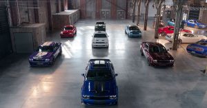 7 2019 Dodge Challengers parked inside of a warehouse